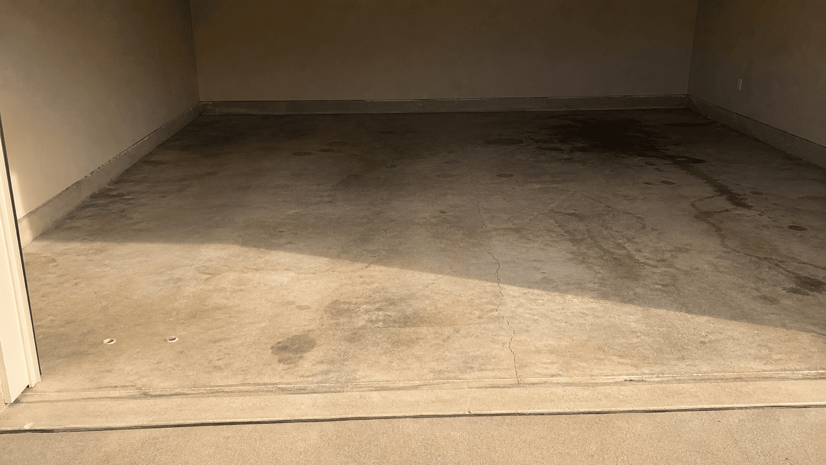 Garage Floor Leveling — concrete leveling work in progress on a North Texas residential slab
